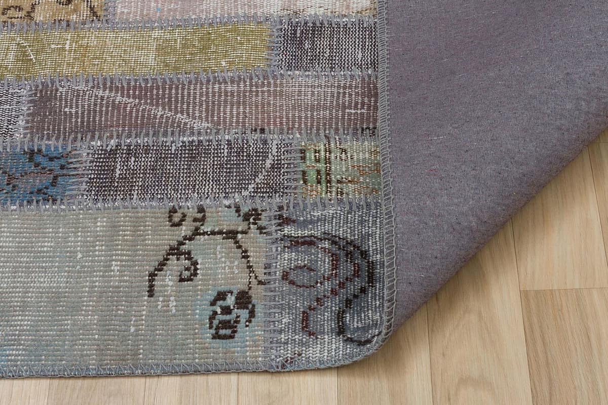 Patchwork-Textured Distressed Rug — detail view 3, handmade vintage rug