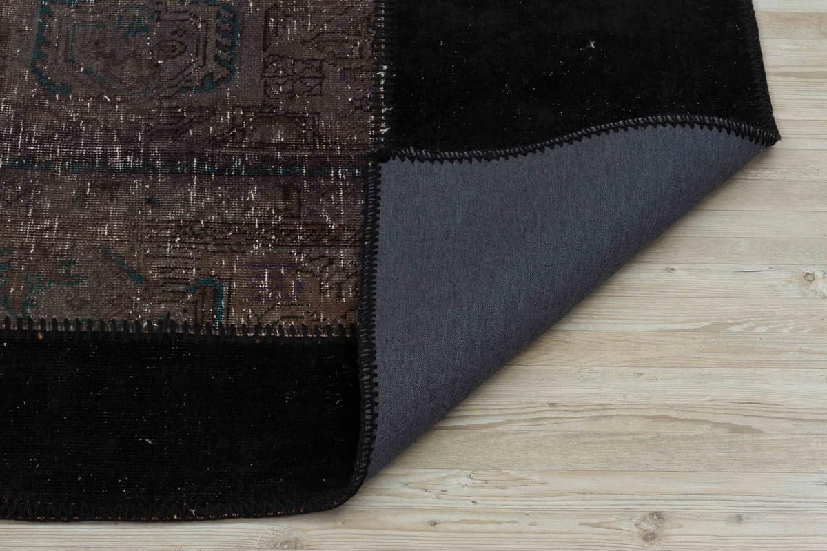 Anatolian-Patterned Distressed Patchwork Rug — detail view 3, handmade vintage rug
