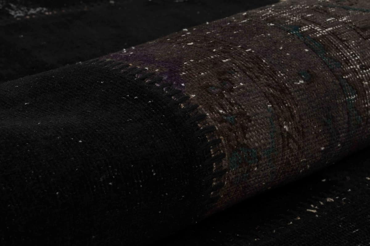 Anatolian-Patterned Distressed Patchwork Rug — detail view 4, handmade vintage rug